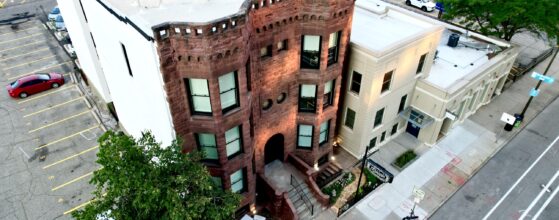 Aerial view of the 1889 Oaklands on 9th brownstone and the surrounding South 9th Street blocks in downtown Minneapolis.