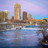 View of downtown Minneapolis from the Stone Arch Bridge, an easy car-free walk and bike route near Oaklands on 9th.