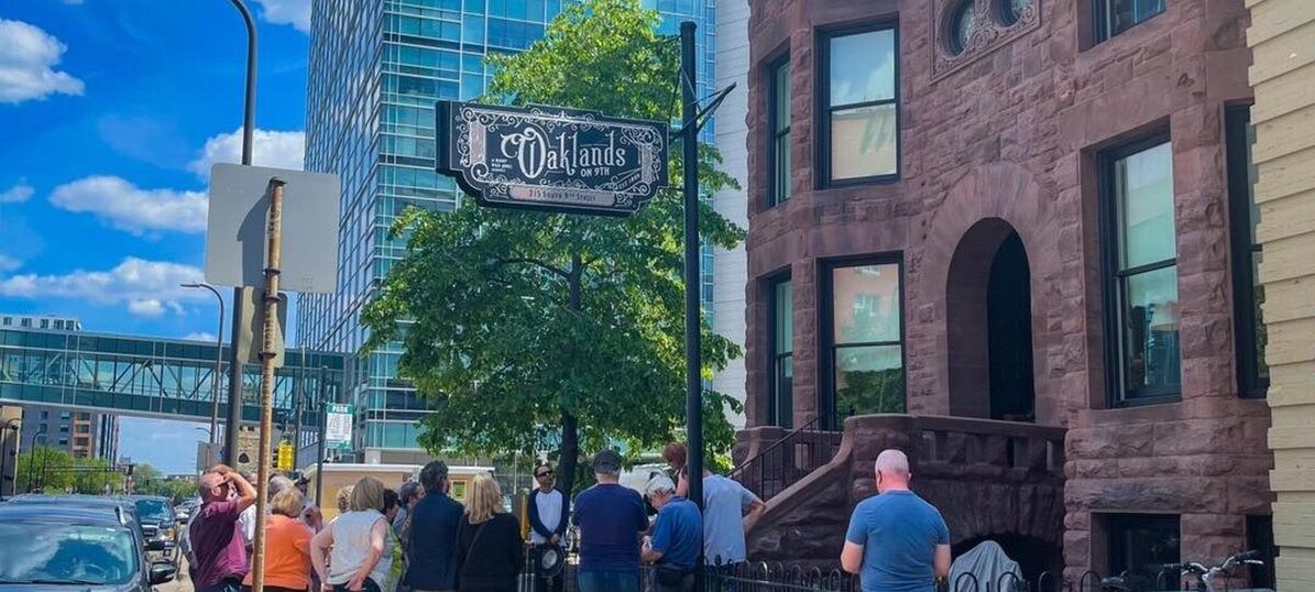 Restored 1889 brownstone exterior of Oaklands on 9th at 215 South 9th Street in walkable downtown Minneapolis.